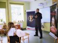 Spotkanie kolonistów z kolejarzem i strażnikami ochrony kolei