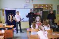 Spotkanie kolonistów z kolejarzem i strażnikami ochrony kolei