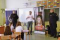 Spotkanie kolonistów z kolejarzem i strażnikami ochrony kolei
